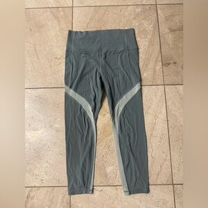 Athleta Small Green Salutation Stash Pocket 7/8 Tight legging women's medium